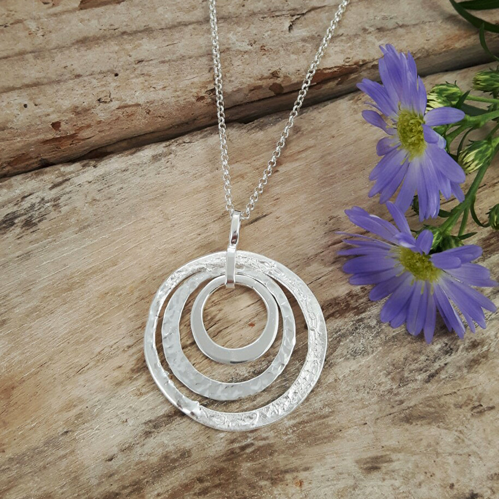 Sterling silver circle on sale pendant